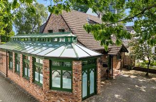 Einfamilienhaus kaufen in 41564 Kaarst, Einzigartiges Architektenhaus mit Wintergarten-Oase — Wohnen und Arbeiten unter einem Dach in Kaarst