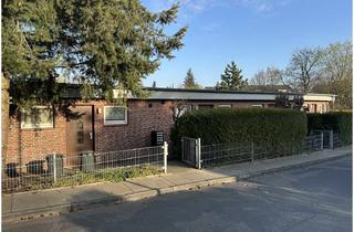 Mehrfamilienhaus kaufen in 21680 Stade, Renditeobjekt - Mehrfamilienhaus mit 4 Wohneinheiten und 8 Garagen in Stade