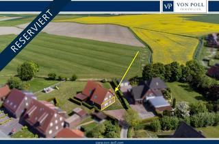 Wohnung kaufen in 26427 Werdum, Stilvolle Erdgeschosswohnung mit Garten in Werdum – Ihr Rückzugsort an der Nordsee