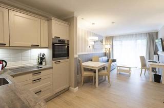 Wohnung kaufen in 18225 Kühlungsborn, Modernes Ferienapartment mit Betreiberkonzept, direkter Zugang zur Stradpromenade inklusive