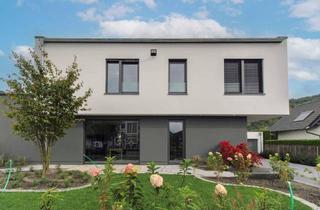 Einfamilienhaus kaufen in 53506 Hönningen, Exklusiver Neubau mit Doppelgarage und großem Garten in idyllischer Lage von Hönningen