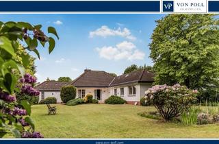 Einfamilienhaus kaufen in 24787 Fockbek, Bungalow auf weitläufigem Gartengrundstück für stilvolles Wohnen und Lebensqualität
