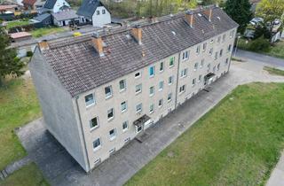 Mehrfamilienhaus kaufen in 16792 Zehdenick, Attraktive Kapitalanlage! Mehrfamilienhaus mit 12 WE und Garagen direkt am Wasser in Zehdenick