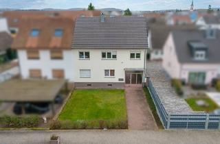 Einfamilienhaus kaufen in 76297 Stutensee, Vermietetes Zweifamilienhaus mit Bauplatz in zweiter Reihe – Vielseitiges Entwicklungspotenzial