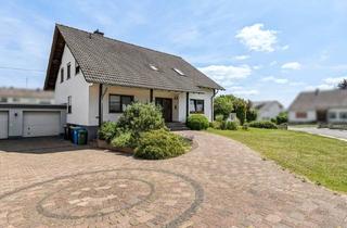 Haus kaufen in 55494 Rheinböllen, Teilvermietet - Zweifamilienhaus in Rheinböllen