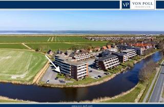 Wohnung kaufen in 26553 Dornum, Wohnen zwischen Grün und Blau: Sanierte Erdgeschosswohnung mit Feld- und Kanalblick in Dornumersiel