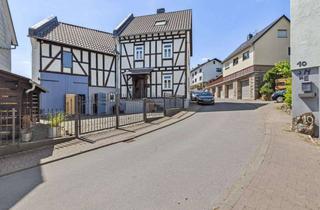 Einfamilienhaus kaufen in 35796 Weinbach, Charmantes Einfamilienhaus mit Scheune, Gartenidylle und viel Potenzial in Weinbach-Edelsberg