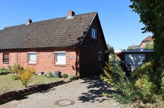 Doppelhaushälfte kaufen in 23626 Ratekau, Doppelhaushälfte mit Garage und großem Garten