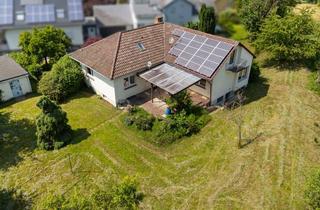 Einfamilienhaus kaufen in 76287 Rheinstetten, Großzügiges Einfamilienhaus mit 7 Zimmern und parkähnlichem Grundstück in idyllischer Feldrandlage