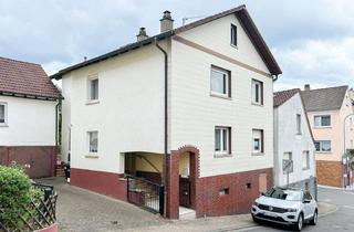 Einfamilienhaus kaufen in 64750 Lützelbach, Einfamilienhaus mit Nebengebäude, Doppelgarage, Garten und Potential: Gestalten Sie Ihr Traumhaus!