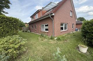Haus kaufen in 27313 Dörverden, Dörverden-Wahnebergen: Zuverlässig vermietetes Zweifamilienhaus mit Doppelgarage in ruhiger Wohnlage