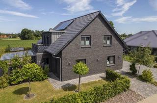 Einfamilienhaus kaufen in 26487 Blomberg, Neuwertiges Zweifamilienhaus mit exklusiver Ausstattung in ruhiger Feldrandlage