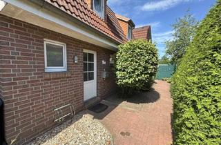 Reihenhaus kaufen in 26419 Schortens, PROVISIONSFREI: Charmantes Reihenhaus mit Terrasse, pflegeleichtem Garten, Garage, 215 m² Grundstück