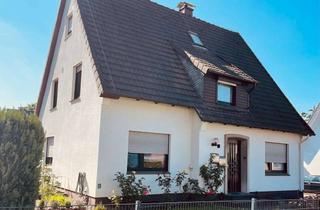Haus kaufen in 33803 Steinhagen, RESERVIERT - Zweifamilienhaus in ruhiger Wohnlage von Steinhagen-Amshausen