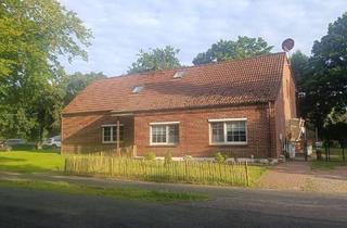 Haus kaufen in 26340 Zetel, Zetel - Doppelhaus mit Weitblick - Vielseitige Wohn- und Investitionsmöglichkeit auf großem Grundstück in Zetel-Bohlenbergerfeld