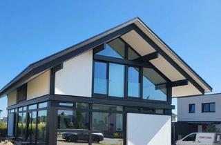 Einfamilienhaus kaufen in 91097 Oberreichenbach, Oberreichenbach bei Herzogenaurach - Freistehendes HUF Einfamilienhaus in idyllischer Lage mit traumhafter Aussicht bei Herzogenaurach