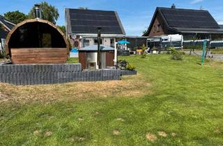 Einfamilienhaus kaufen in 27639 Wurster Nordseeküste, Wurster Nordseeküste - Haus mit PV, Whirlpool, Sauna und eigenem Wald