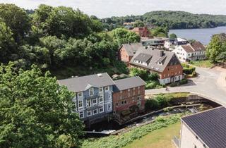 Wohnung kaufen in Eutiner Straße, 23714 Malente, Kernsanierte Obergeschosswohnung in der historischen Gremsmühle an der Schwentine mit 2 Balkonen