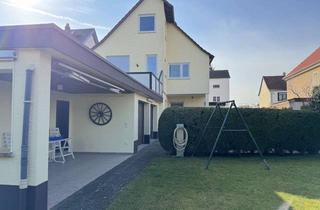 Mehrfamilienhaus kaufen in 64546 Mörfelden-Walldorf, Großes Mehrfamilienhaus mit Garten in schöner Lage von Mörfelden