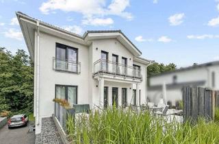 Einfamilienhaus kaufen in 35423 Lich, Exklusives Einfamilienhaus im Neubaugebiet von Lich – modernes Wohnen mit Stil und Komfort