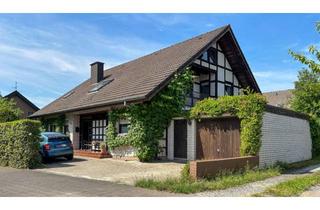 Einfamilienhaus kaufen in 33803 Steinhagen, Einfamilienhaus mit vermieteter Einliegerwohnung und idyllischem Garten***4215 G in Steinhagen