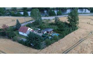 Anlageobjekt in Gordemitzer Straße, 04425 Taucha, vermietetes Einfamilienhaus als Kapitalanlage - Alleinlage mit 3000m² Grundstück am See