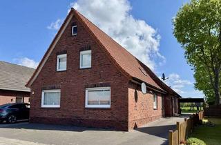 Anlageobjekt in 26871 Papenburg, Wohnimmobilie mit drei Einheiten auf großem Grundstück mit Entwicklungspotenzial