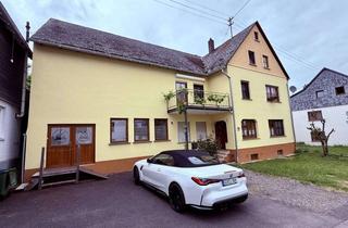 Haus kaufen in 56288 Bell, Zweifamilienhaus mit ehemaliger Schreinerei, Scheune, Halle, Doppelgarage zu verkaufen.