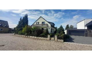 Haus kaufen in 38531 Rötgesbüttel, Rötgesbüttel - ZFH mit 915m2 Grundstueck und Doppelgarage, voll unterkellert