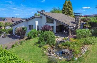 Einfamilienhaus kaufen in 56317 Urbach, Urbach - Architektonisch reizvolles Einfamilienhaus mit ELW in ruhiger Ortsrandlage von Urbach!