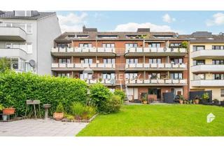 Wohnung kaufen in 40591 Düsseldorf, Düsseldorf - Einfach mal die Ruhe genießen- Gepflegte EG-Wohnung mit großem Garten, Süd-Terrasse & moderner EBK