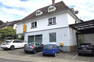 Wohnung kaufen in 69412 Eberbach, Charmante Dreizimmerwohnung mit Entwicklungsmöglichkeiten und geringem Renovierungsbedarf.