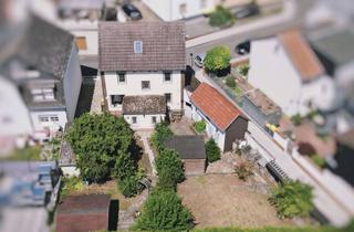 Einfamilienhaus kaufen in Römergasse, 61184 Karben, Renovierungsbedürftiges Einfamilienhaus mit tollem Garten und Nebengebäude nahe S-Bahn in Okarben