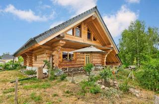 Haus kaufen in 15326 Zeschdorf, Neubau-Blockhaus mit Terrasse und nachhaltiger Bauweise