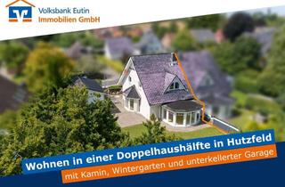 Doppelhaushälfte kaufen in 23715 Bosau, Gepflegte Doppelhaushälfte in Hutzfeld mit Feldblick und Garage