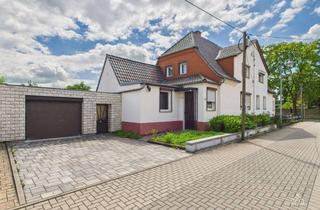 Doppelhaushälfte kaufen in 39418 Staßfurt, Sanierungsbedürftige Doppelhaushälfte in Staßfurt zu verkaufen
