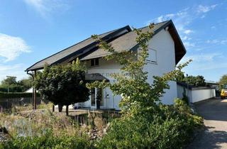 Einfamilienhaus kaufen in 66450 Bexbach, Freistehendes Einfamilienhaus mit Wärmepumpe und Option für Hobby und Beruf in unmittelbarer Nähe
