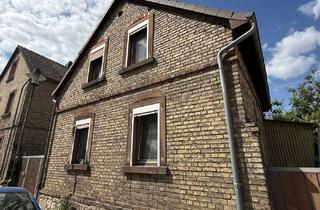 Haus kaufen in 55262 Heidesheim, Sanierungs- oder Neubauprojekt mit genehmigtem Anbaupotenzial in zentraler Lage von Heidesheim