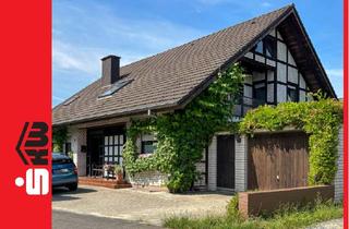 Einfamilienhaus kaufen in 33803 Steinhagen, Steinhagen - Einfamilienhaus mit vermieteter Einliegerwohnung und idyllischem Garten***4215 G in Steinhagen