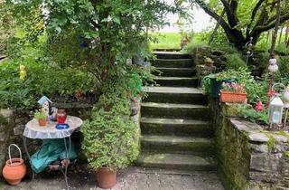 Einfamilienhaus kaufen in 97237 Altertheim, Einfamilienhaus mit traumhaftem, eingewachsenem Garten.