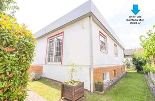 Einfamilienhaus kaufen in 65439 Flörsheim, Flörsheim am Main - Freistehender Bungalow im Herzen von Flörsheim