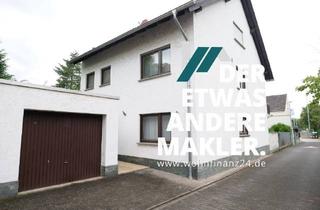Einfamilienhaus kaufen in 55294 Bodenheim, Familienfreundliches Einfamilienhaus mit Garten und zwei Garagen!