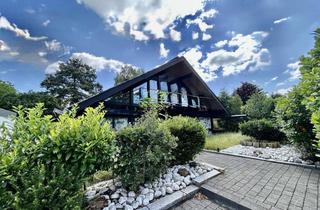 Einfamilienhaus kaufen in 51519 Odenthal, Exklusives Einfamilienhaus mit Doppelgarage und Pool in ruhiger Wohnlage.