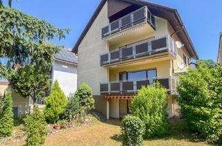 Mehrfamilienhaus kaufen in 76698 Ubstadt-Weiher, Großzügiges Mehrfamilienhaus mit 3 Wohneinheiten, Garten und 3 Garagenplätzen