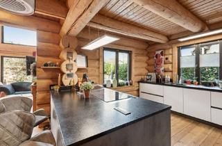 Einfamilienhaus kaufen in 72574 Bad Urach, Stilvolles Blockhaus: Einfamilienhaus in idyllischer Lage von Sirchingen