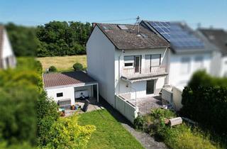 Reihenhaus kaufen in 65936 Frankfurt, Charmantes Reihenhaus in naturnaher Lage an der Nidda!