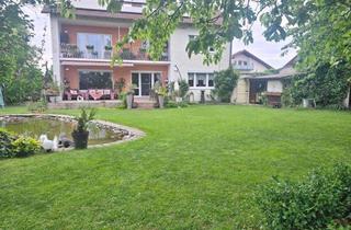 Haus kaufen in 84539 Ampfing, Zweifamilienhaus mit Ausbaureserve und Traumgarten – Viel Platz für Ihre Wohnideen!