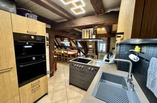 Wohnung kaufen in 71272 Renningen, Wunderschöne Dachgeschosswohnung im denkmalgeschützten Haus