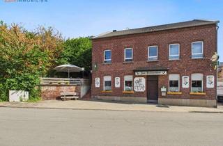 Gewerbeimmobilie kaufen in 41836 Hückelhoven, Attraktive Traditionsgaststätte mit Biergarten, drei Wohnungen und Garten in Hückelhoven-Brachelen