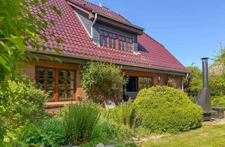 Einfamilienhaus kaufen in 25872 Ostenfeld, Wohnidylle pur – Großzügiges Einfamilienhaus mit parkähnlichem Grundstück